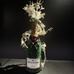 Eine Flasche Moët et Chandon als Siegesspritzer gestaltet